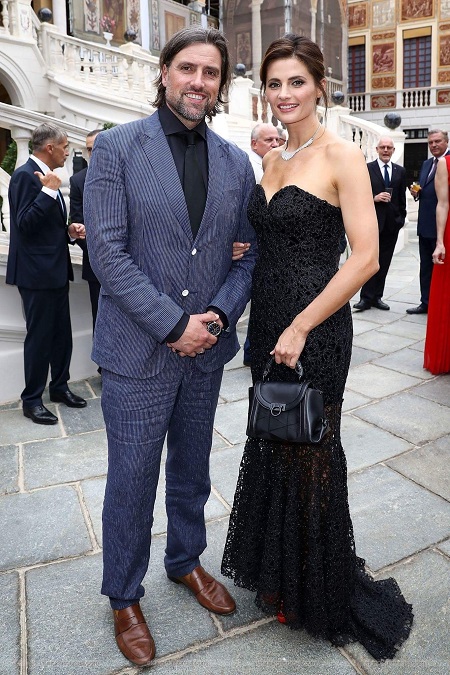 Stana Katic poses for a photo with her husband Kris Brkljac while attending a cocktail party at the 2017 Monte Carlo TV Festival on June 18, 2017, at Monaco Palace in Monaco.
